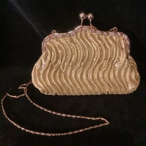 Gold sequenced and rhinestone stone clutch with gold chain and ball snap closure